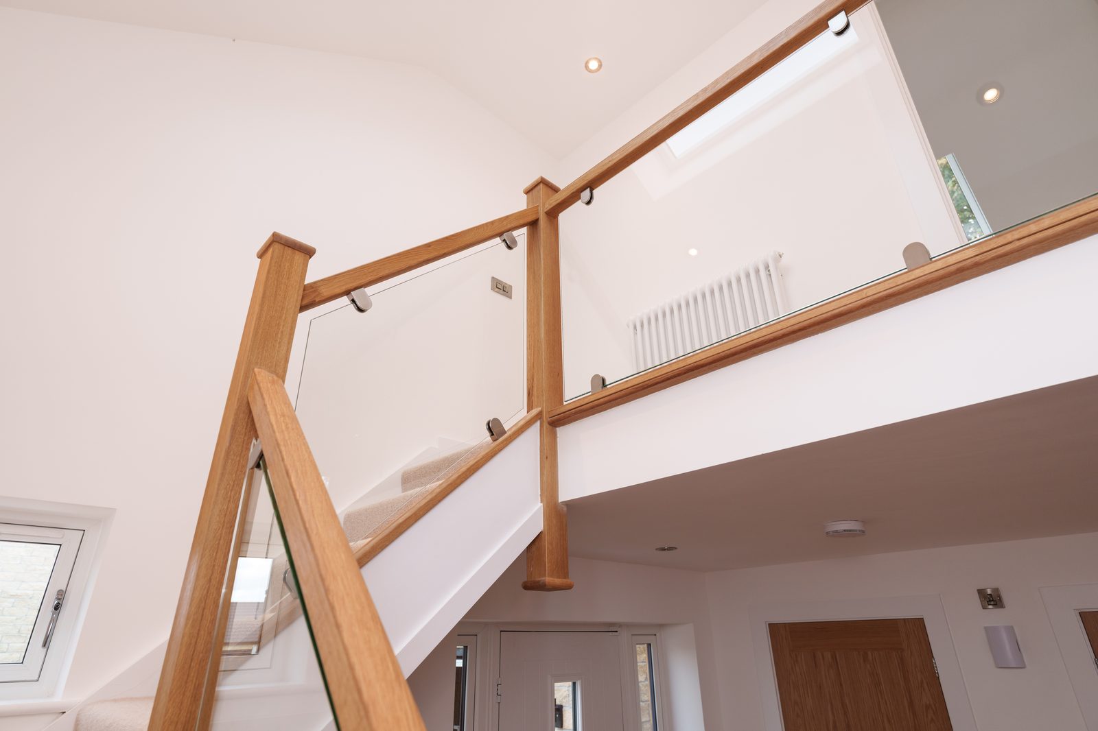 Oak and glass staircase - new build homes in Yorkshire